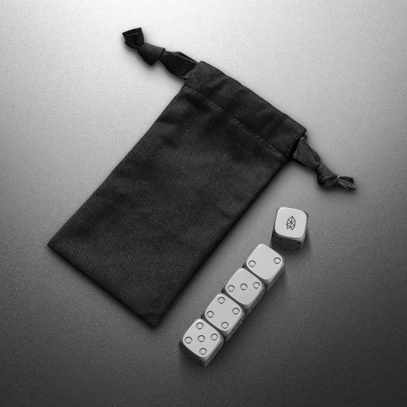 The James Brand Titanium Dice Set