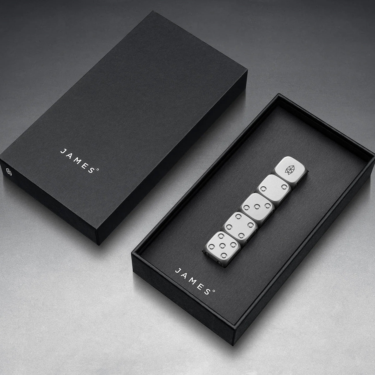 The James Brand Titanium Dice Set