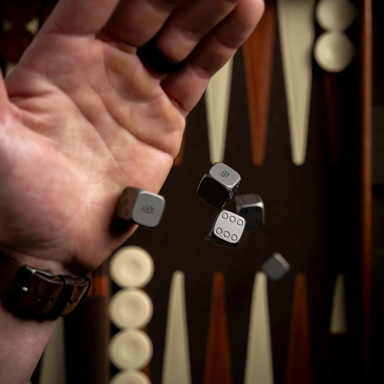The James Brand Titanium Dice Set