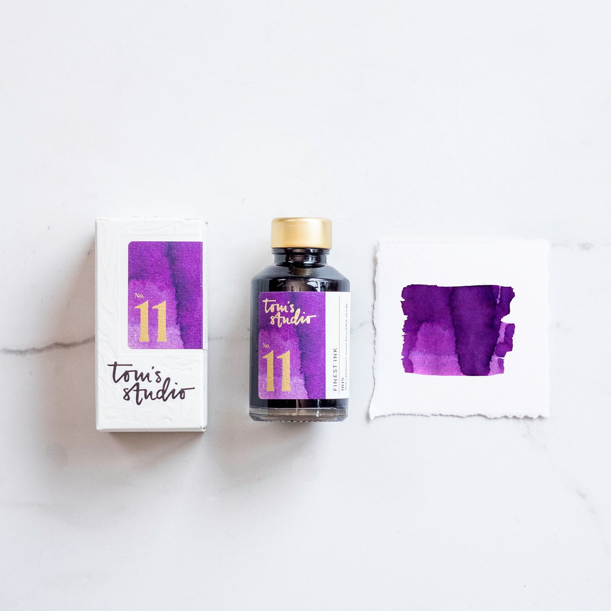 Tom’s Studio Fountain Pen Ink, 11 Iris, flaske, emballasje og fargeprøve