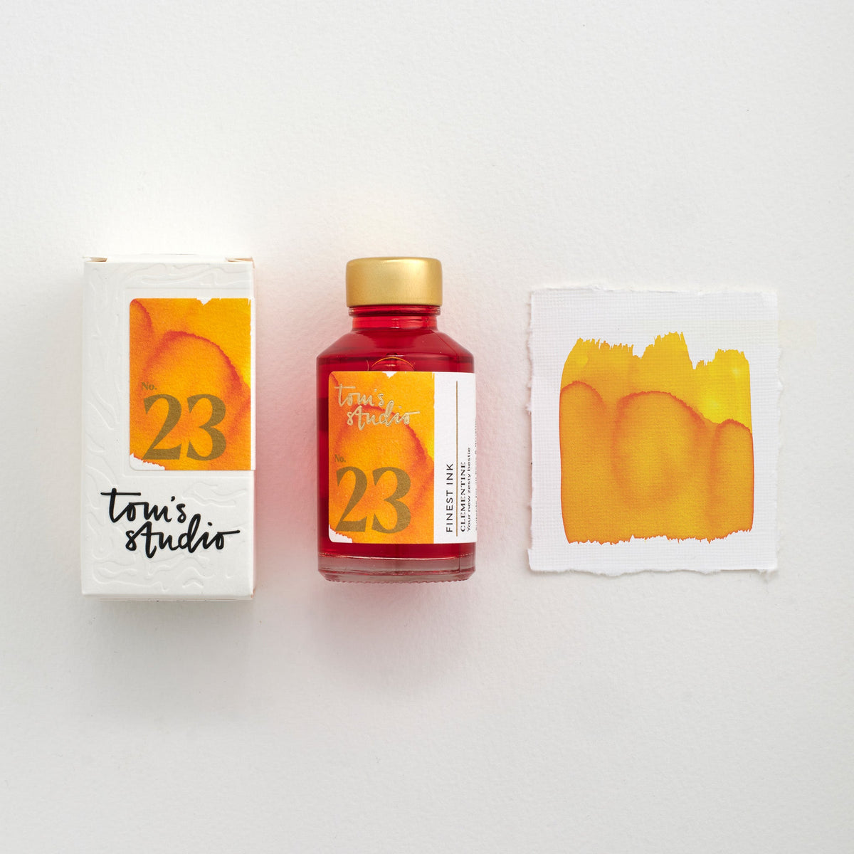 Tom’s Studio Fountain Pen Ink, 23 Clementine, flaske, emballasje og fargeprøve